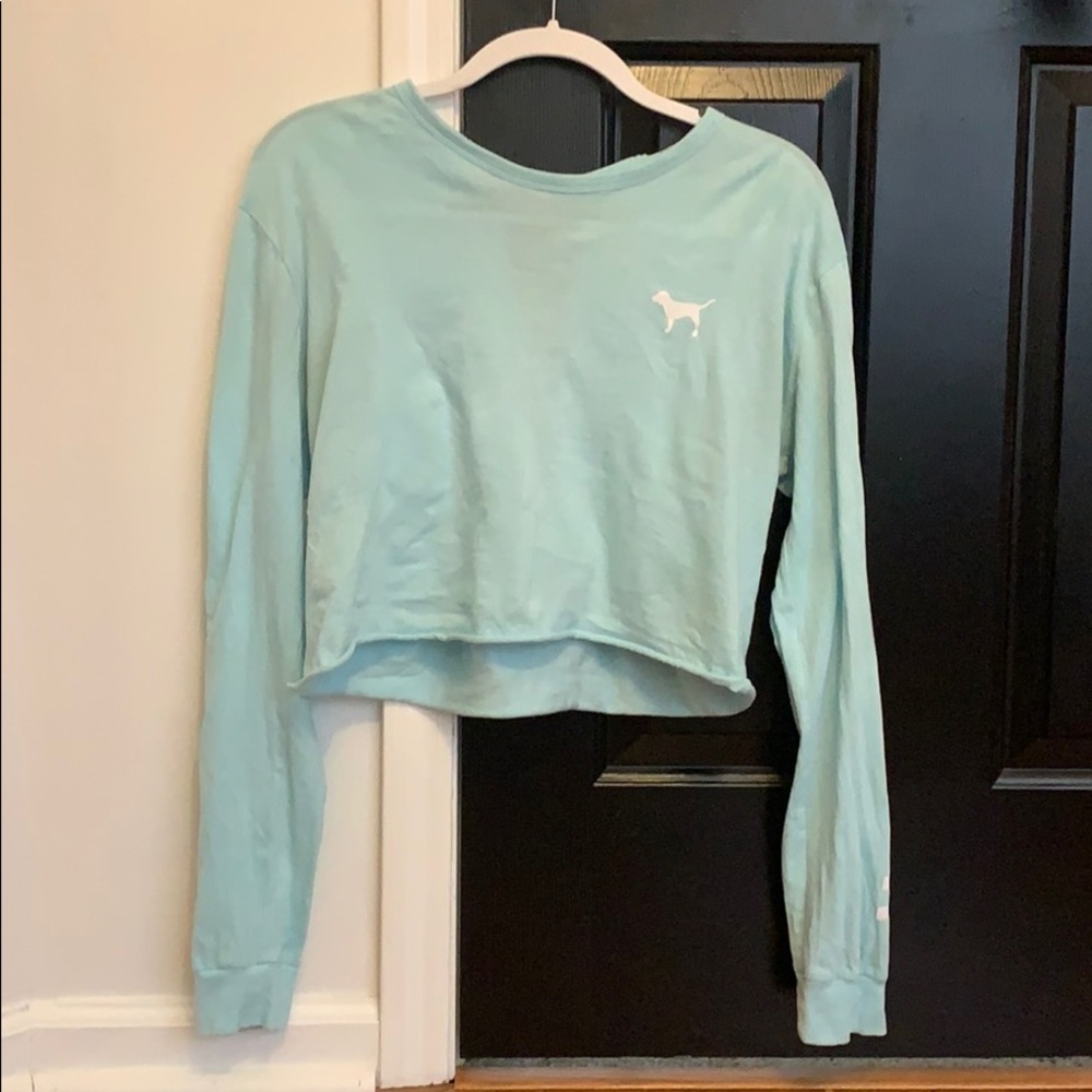 Size medium. cropped, back laced, long sleeve